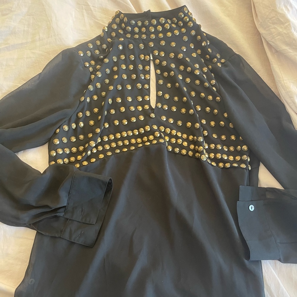 Women’s sheer top with gold bead detail